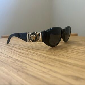 Versace Vintage 1990s Sunglasses in Black with Gold Medusa Detail